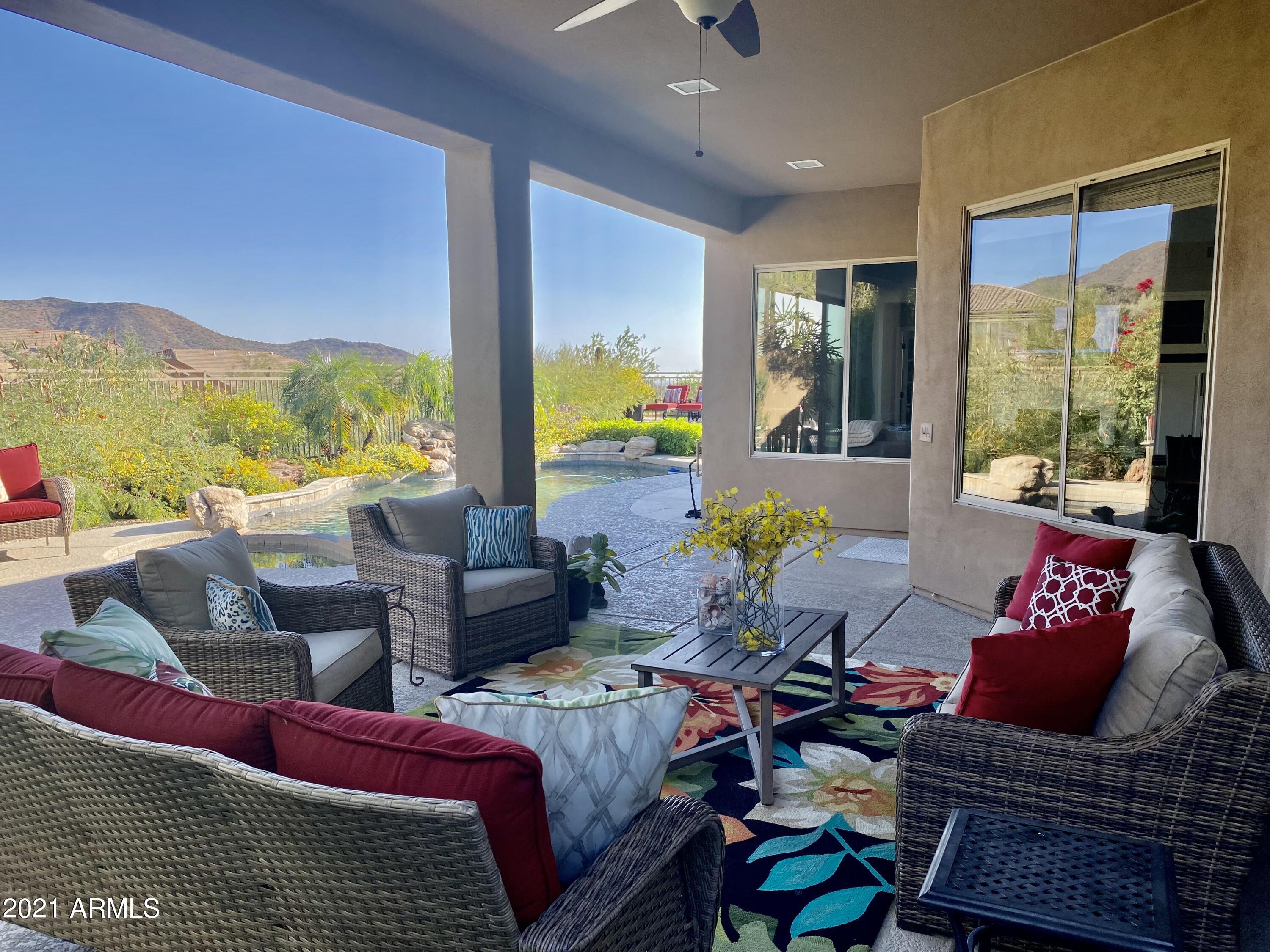 16715 North 108th Way Scottsdale, AZ 85255 - Photo 13 of 104 a living room with furniture and a large window