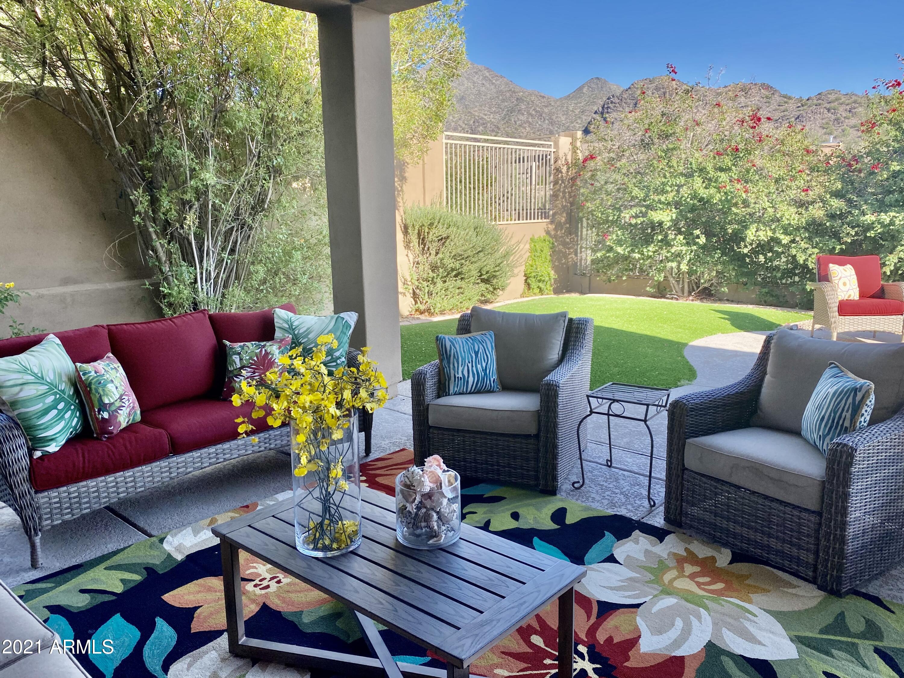 16715 North 108th Way Scottsdale, AZ 85255 - Photo 14 of 104 a outdoor living space with furniture and a potted plant