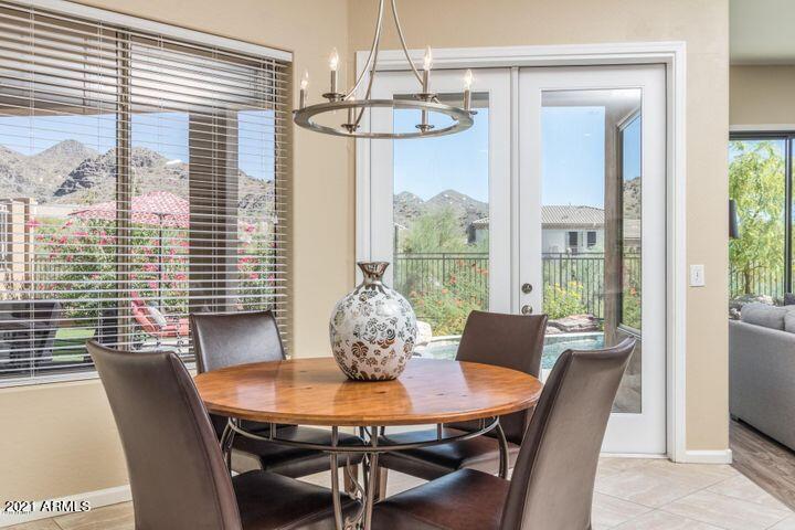 16715 North 108th Way Scottsdale, AZ 85255 - Photo 34 of 104 a view of a dining room with furniture window and outside view