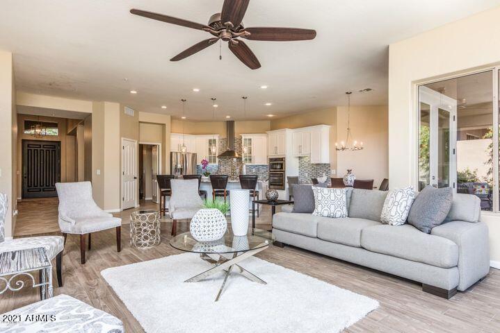 16715 North 108th Way Scottsdale, AZ 85255 - Photo 36 of 104 a living room with furniture and kitchen view
