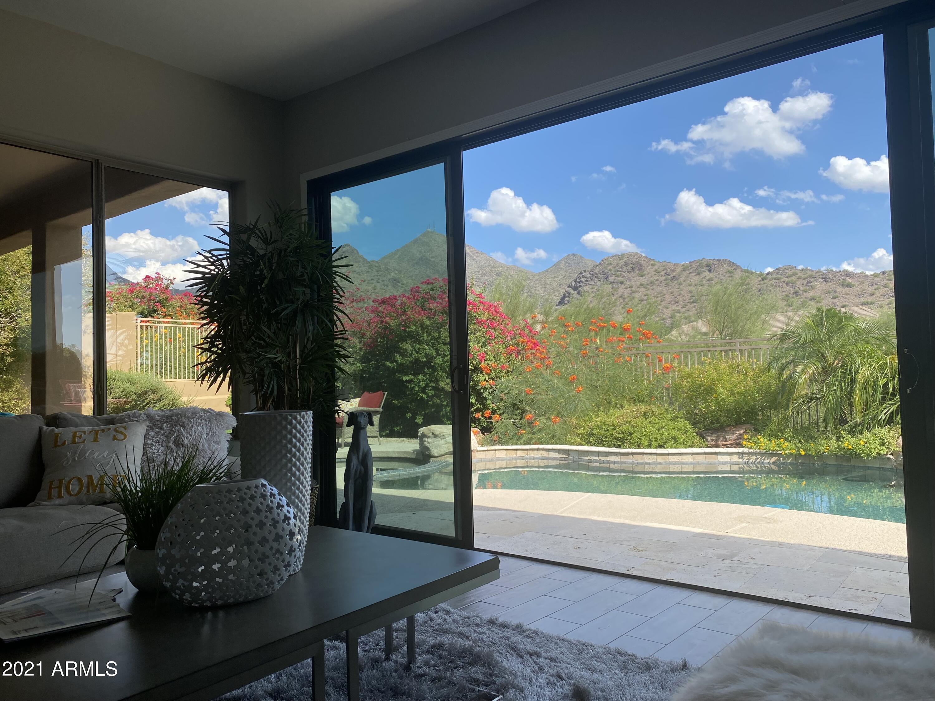 16715 North 108th Way Scottsdale, AZ 85255 - Photo 58 of 104 a view of a porch with furniture and a yard