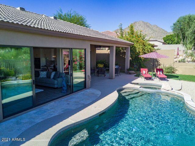 16715 North 108th Way Scottsdale, AZ 85255 - Photo 66 of 104 a view of a house with backyard porch and sitting area