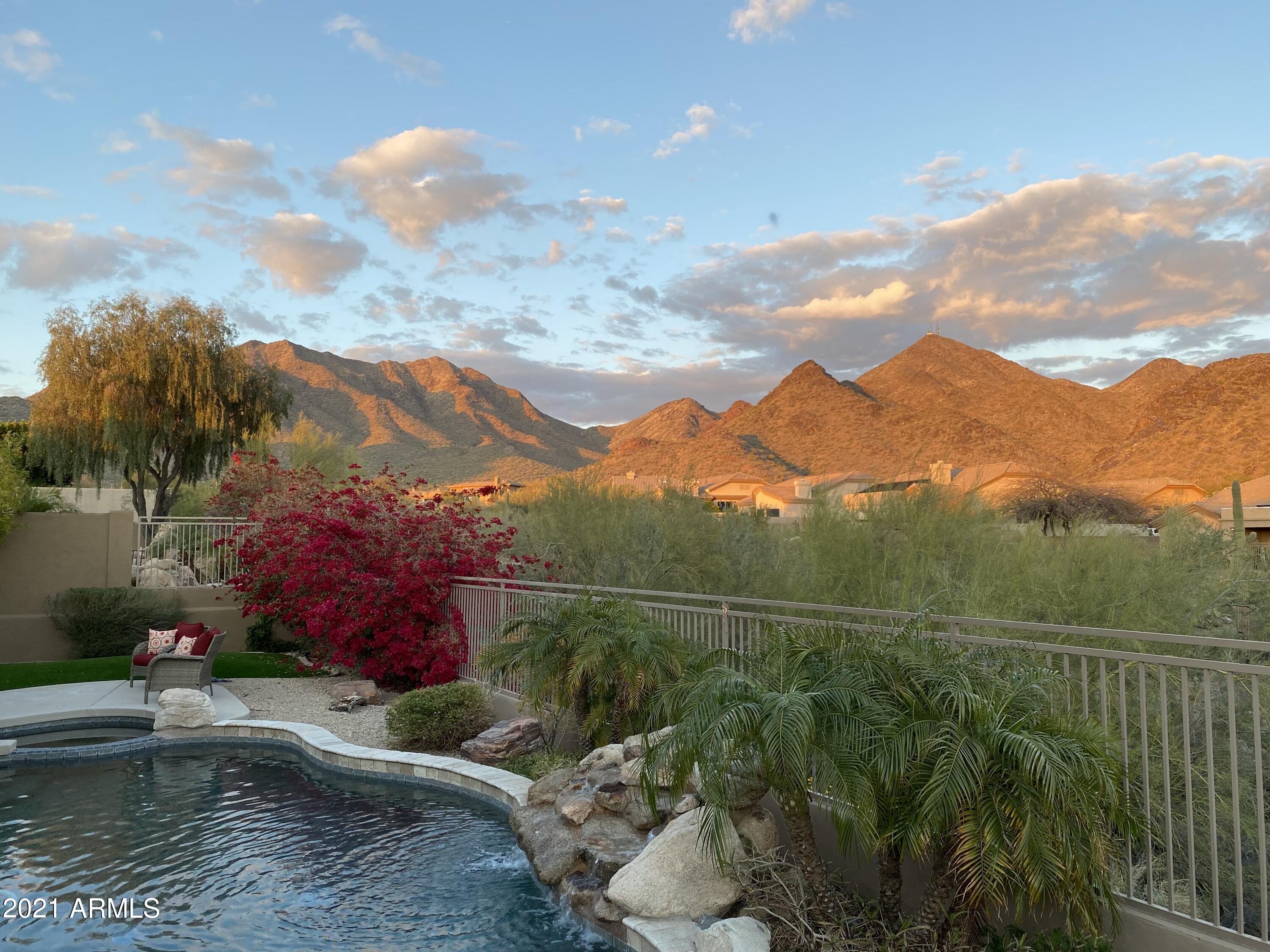 16715 North 108th Way Scottsdale, AZ 85255 - Photo 82 of 104 a view of a lake with a mountain in the background