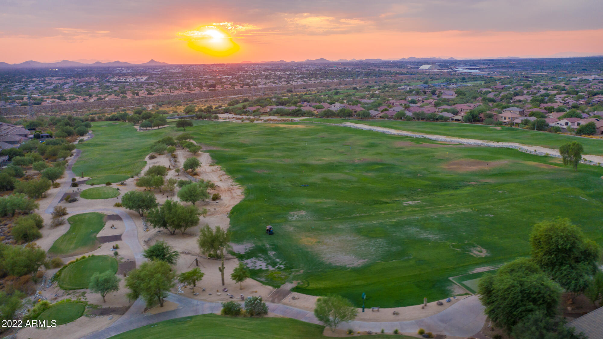 16715 North 108th Way Scottsdale, AZ 85255 - Photo 91 of 104 a view of a lush green field with mountains in the background