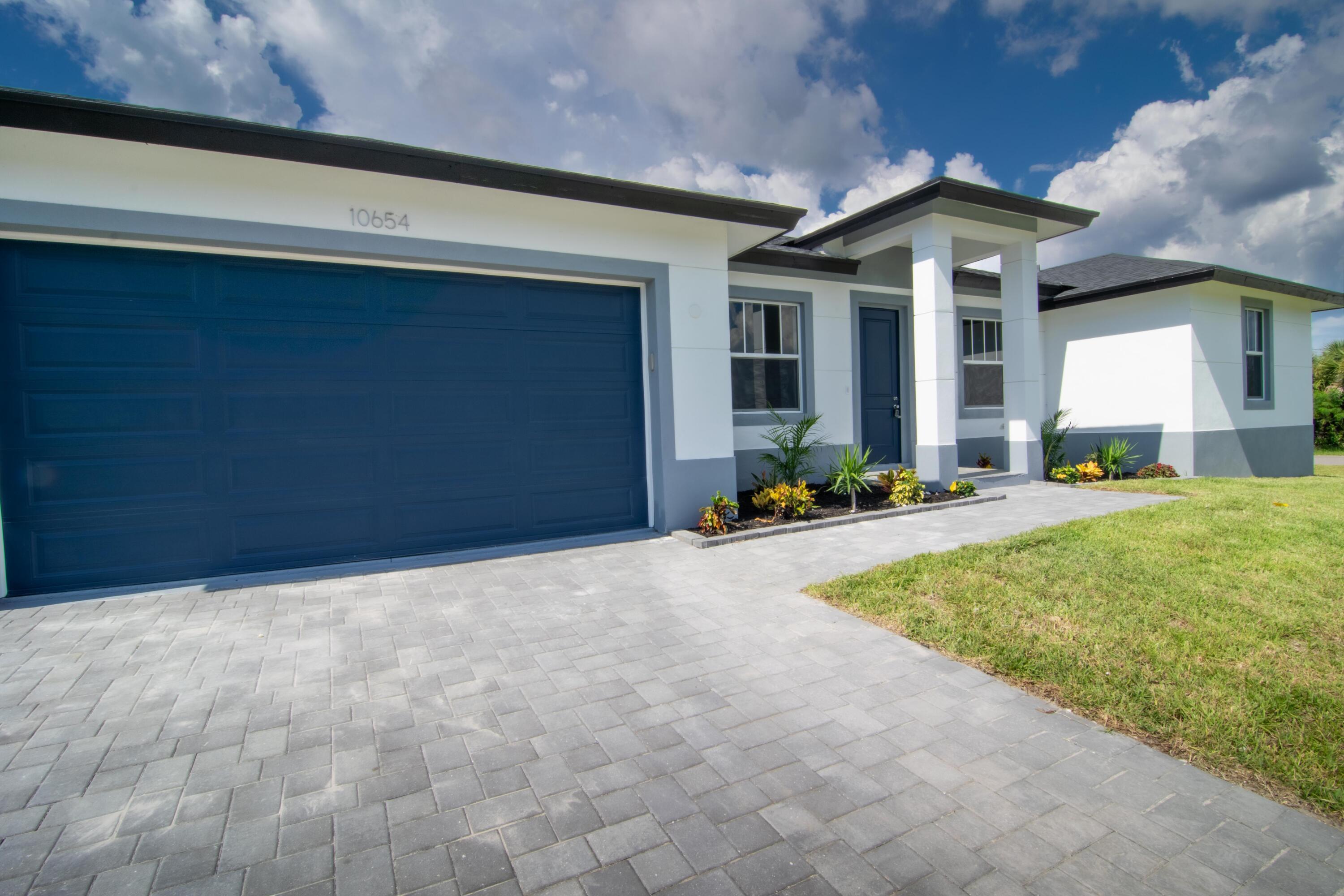 10654 Washington Road Port Charlotte, FL 33981 - Photo 5 of 36 a view of a house with a patio