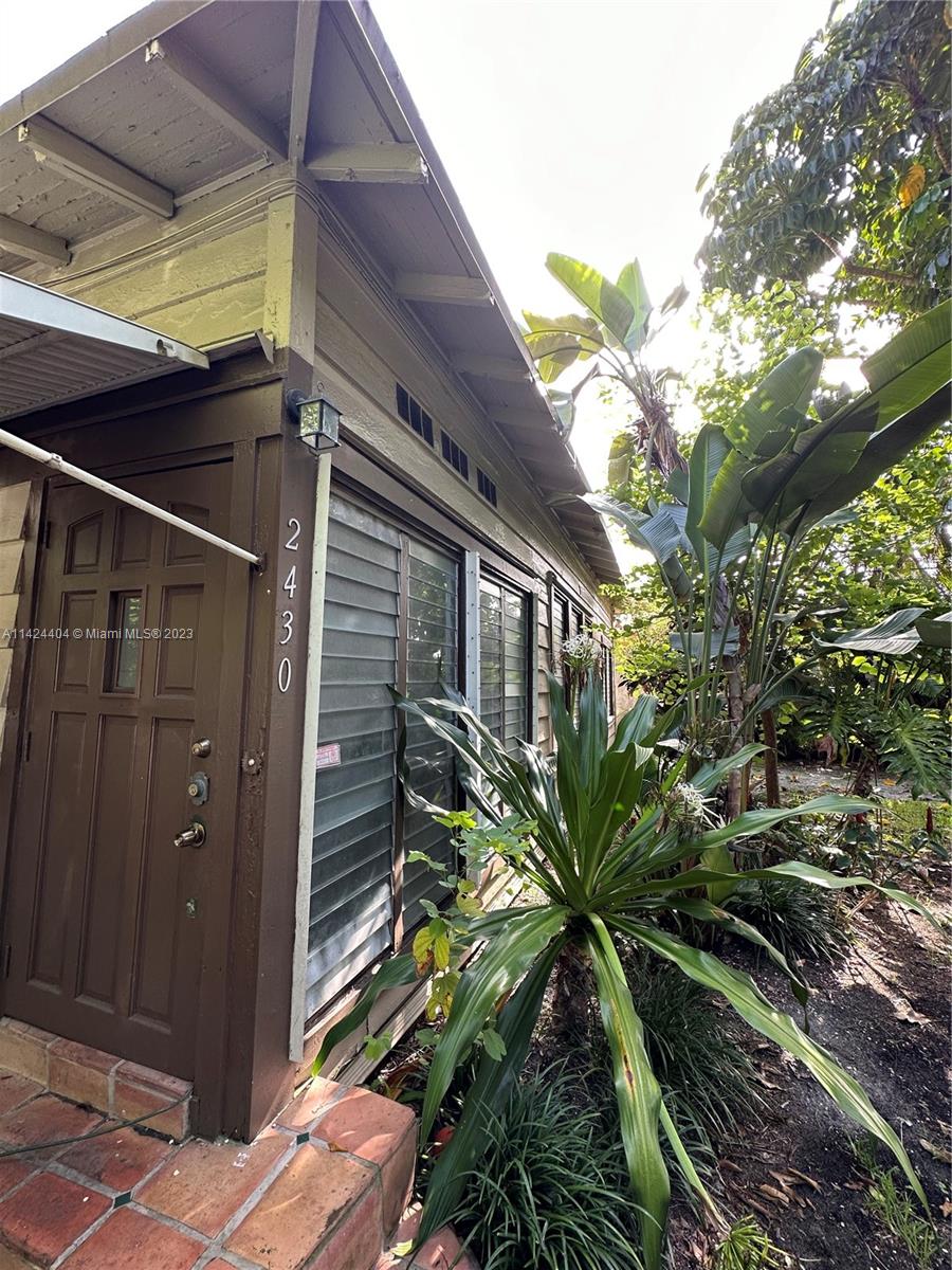 2430 Southwest 25th Terrace, Unit A Miami, FL 33133 - Photo 16 of 19 a backyard of a house
