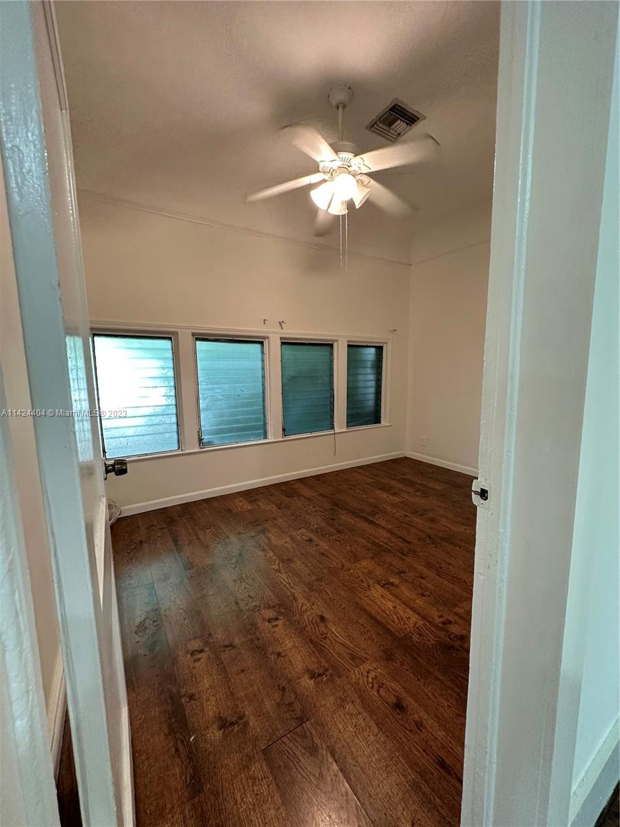 2430 Southwest 25th Terrace, Unit A Miami, FL 33133 - Photo 8 of 19 a view of an empty room and window