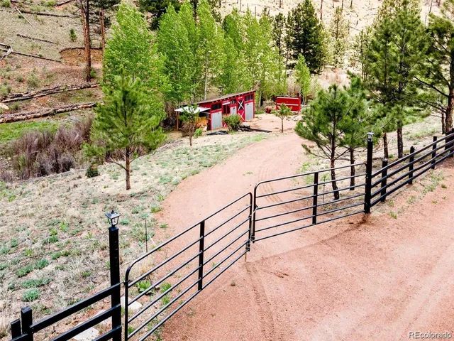 a view of a park with an outdoor seating