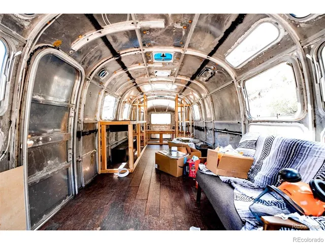 a view of mountains and city