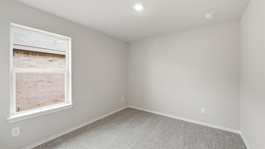 1920 Cherokee Lane Cleburne, TX 76033 - Photo 25 of 34 an empty room with a window