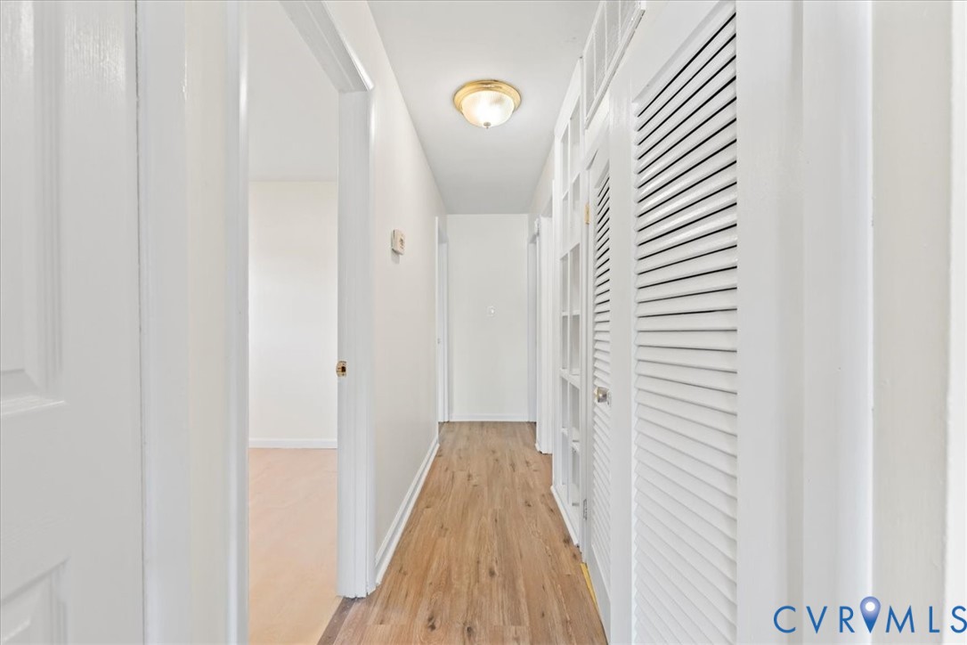 1509 Enon Church Road Chester, VA 23836 - Photo 16 of 32 a view of a hallway with wooden floor