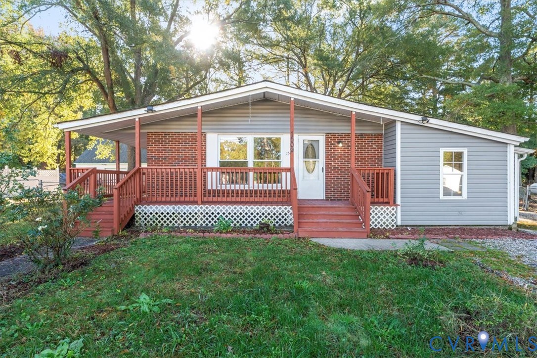 1509 Enon Church Road Chester, VA 23836 - Photo 2 of 32 a front view of a house with garden