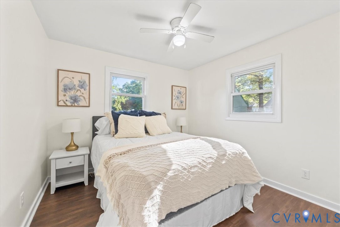 1509 Enon Church Road Chester, VA 23836 - Photo 23 of 32 a bedroom with a bed and a painting on the wall