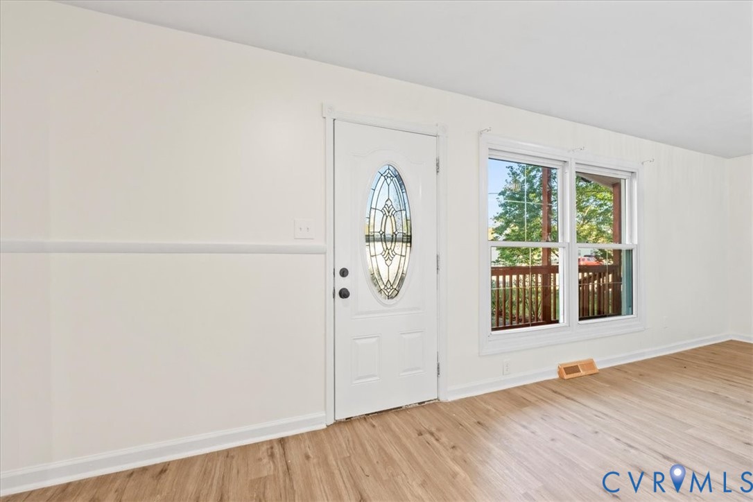 1509 Enon Church Road Chester, VA 23836 - Photo 6 of 32 a view of an empty room with a window