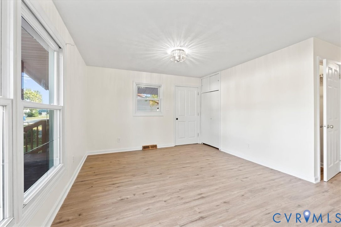 1509 Enon Church Road Chester, VA 23836 - Photo 7 of 32 a view of an empty room with a window