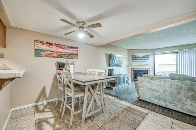 a view of a livingroom with furniture and window