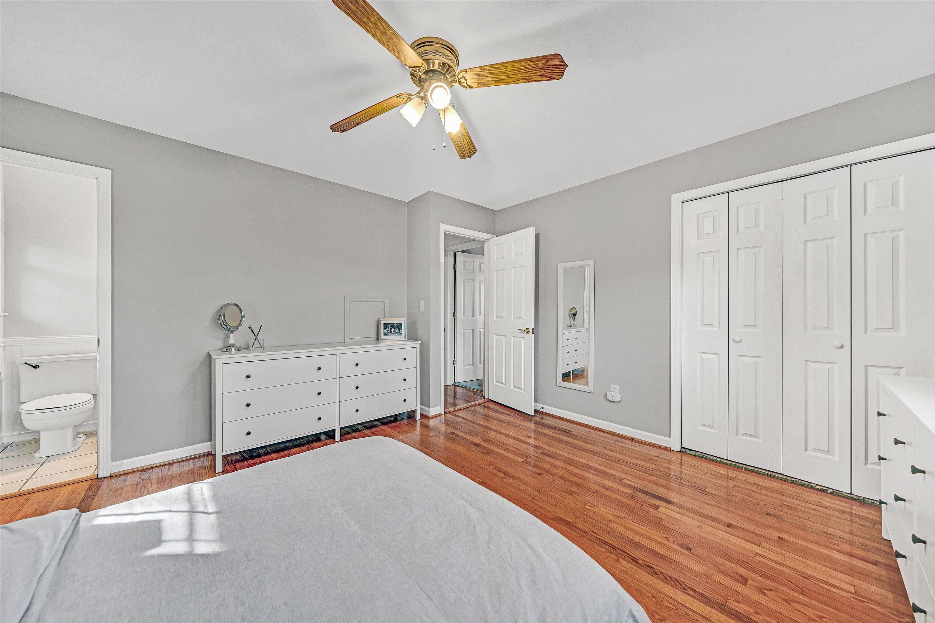3536 Forester Road Southwest Roanoke, VA 24018 - Photo 14 of 26 a room with a dresser and a chandelier fan