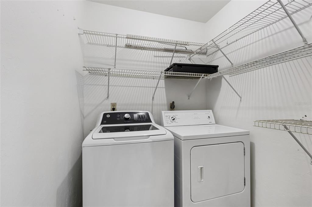 2219 Southwest 39th Way Gainesville, FL 32607 - Photo 8 of 17 a utility room with dryer and washer
