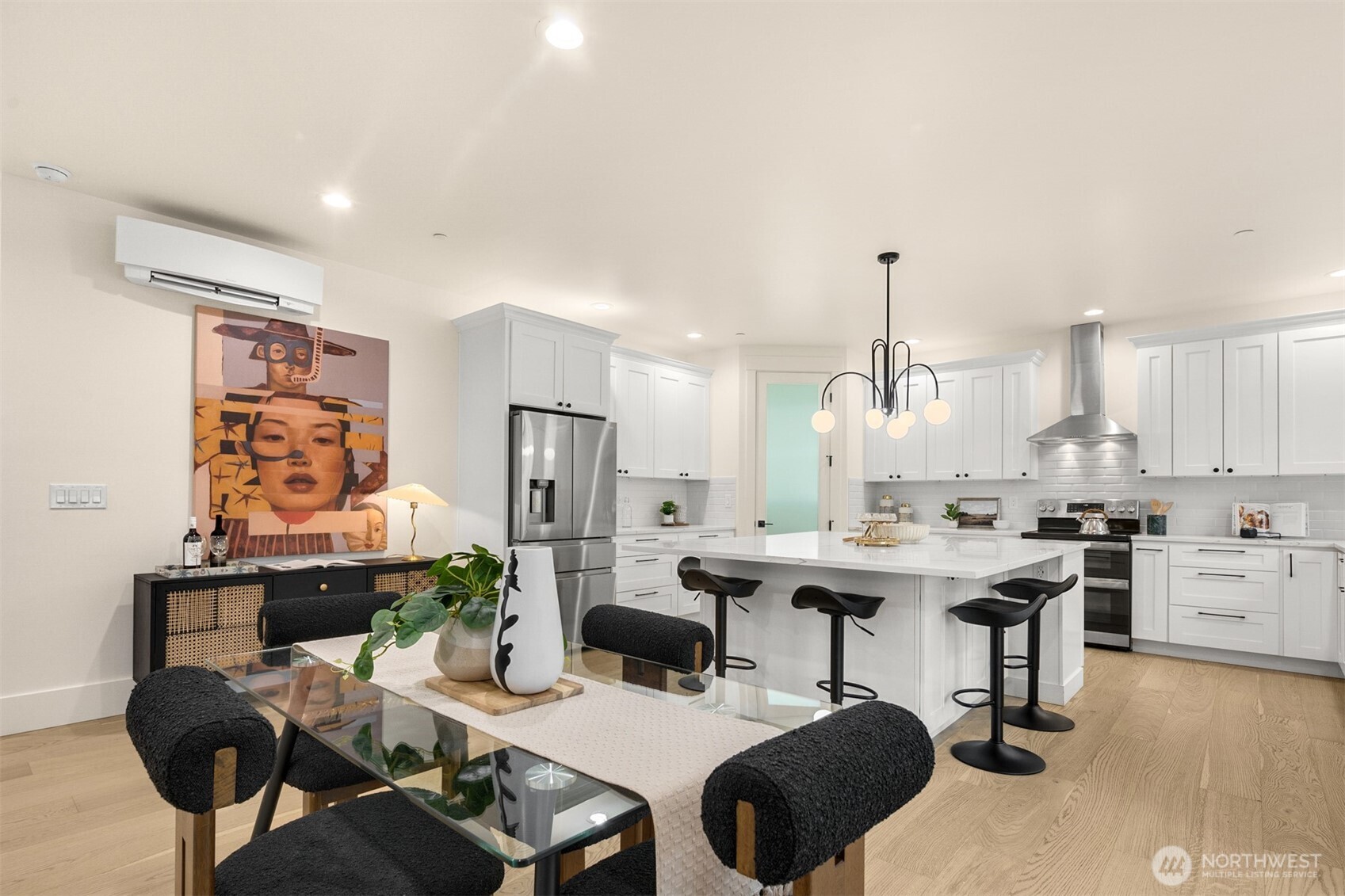 2411 Southwest 346th Street Federal Way, WA 98023 - Photo 12 of 39 a view of a dining room with furniture and chandelier