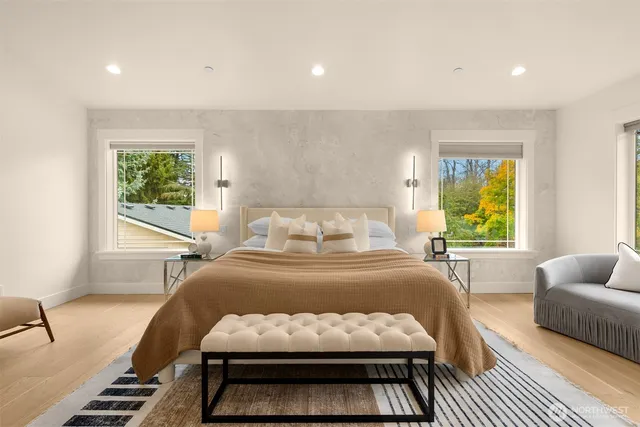 a bedroom with a bed and a couch