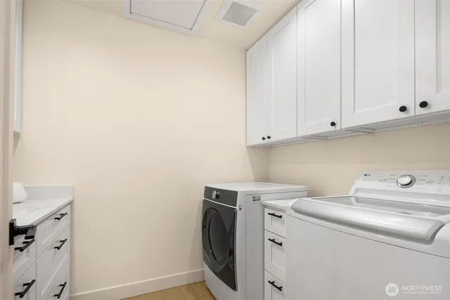 a utility room with dryer and washer