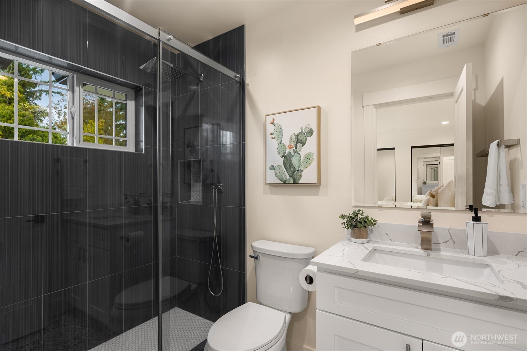2411 Southwest 346th Street Federal Way, WA 98023 - Photo 24 of 39 a bathroom with a sink toilet and shower