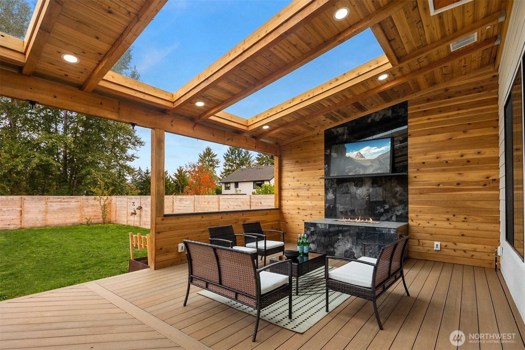 2411 Southwest 346th Street Federal Way, WA 98023 - Photo 26 of 39 a outdoor living space with patio lots of furniture and wooden floor