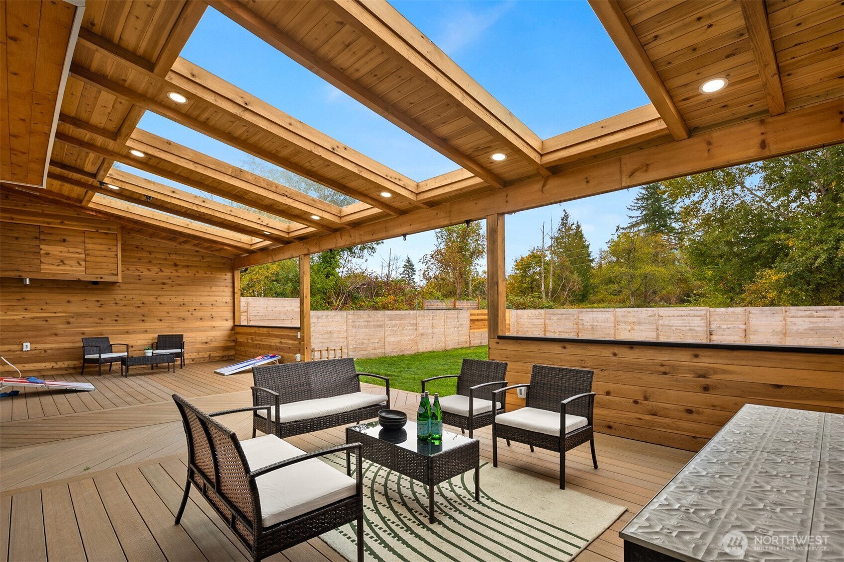 2411 Southwest 346th Street Federal Way, WA 98023 - Photo 27 of 39 a balcony with furniture and a rug