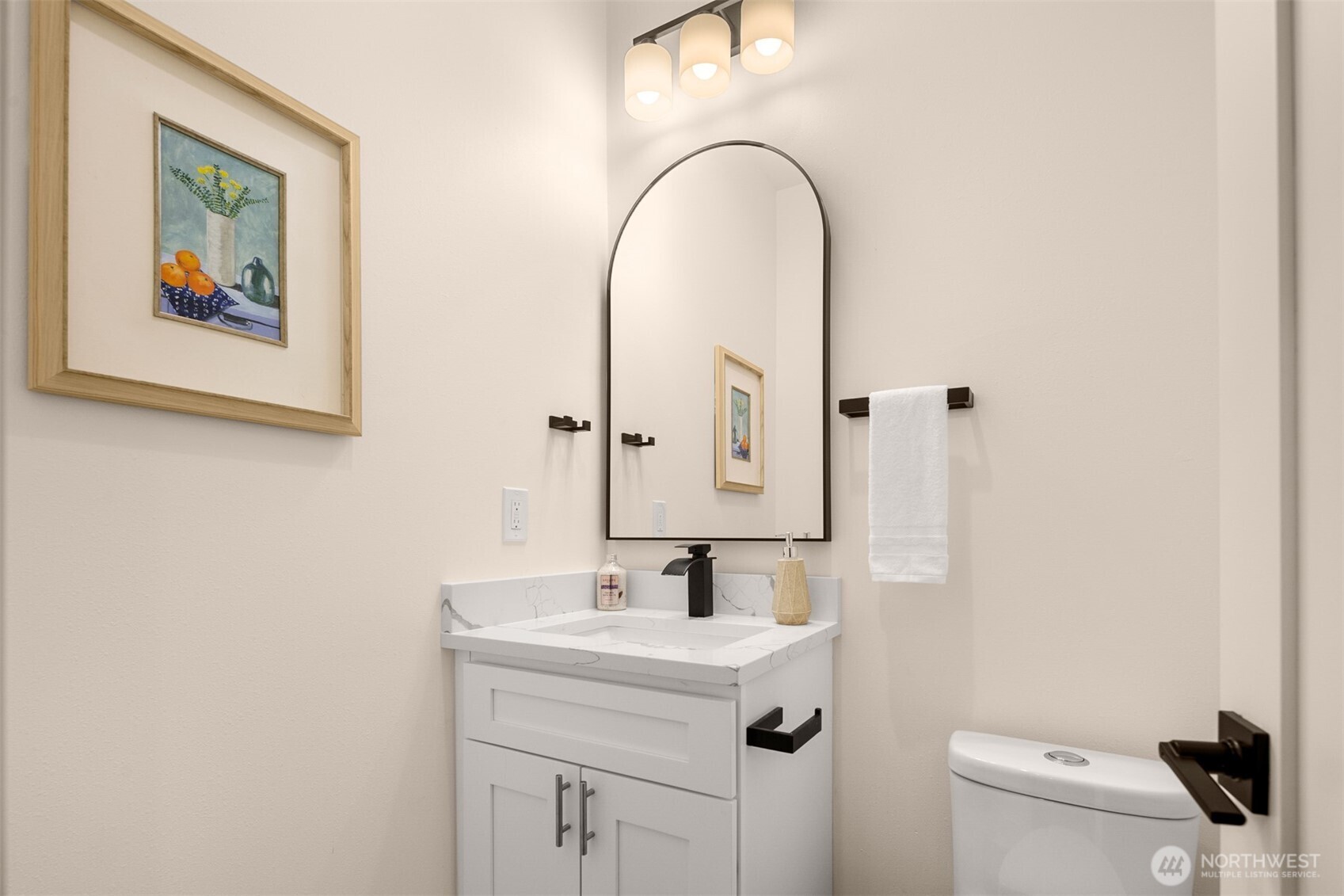 2411 Southwest 346th Street Federal Way, WA 98023 - Photo 31 of 39 a bathroom with a sink and a mirror