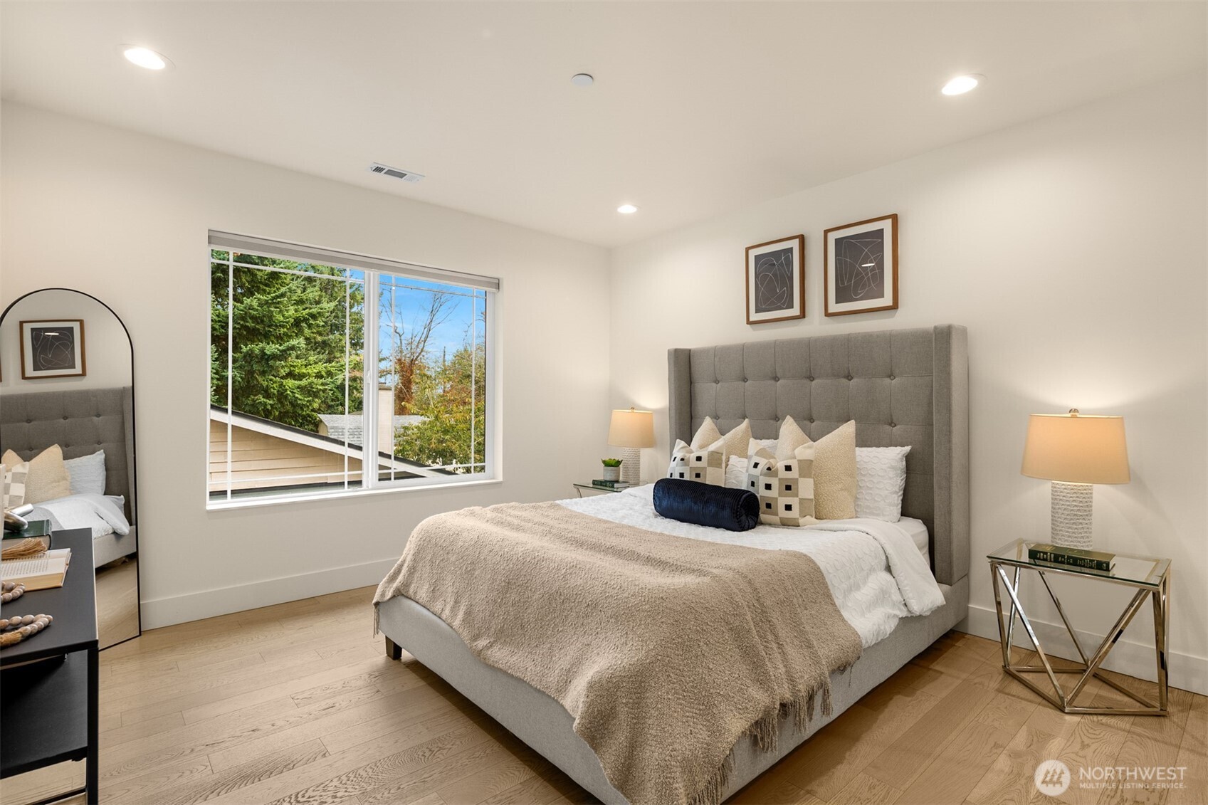 2411 Southwest 346th Street Federal Way, WA 98023 - Photo 34 of 39 a bedroom with a bed lamps and window