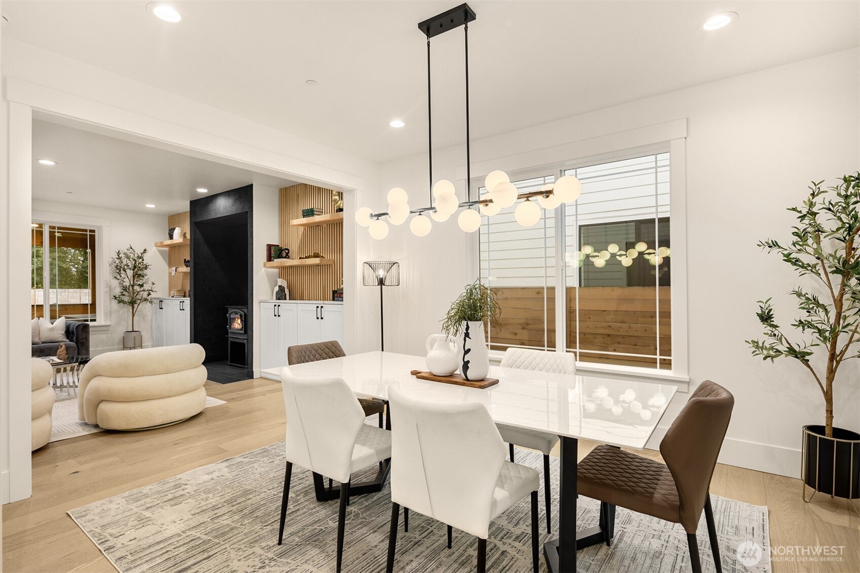 2411 Southwest 346th Street Federal Way, WA 98023 - Photo 8 of 39 a view of a dining room with furniture and chandelier