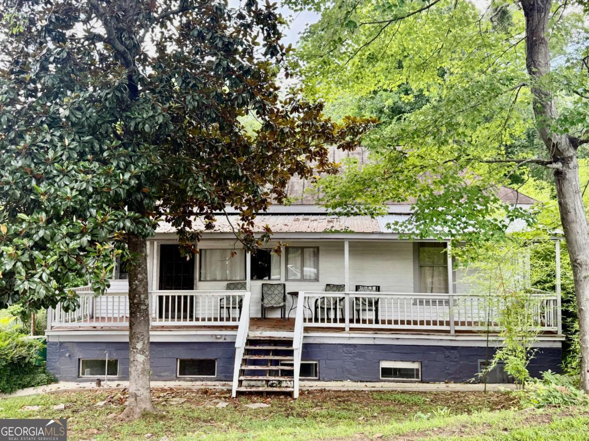 1451 West Broad Street Athens, GA 30601 - Photo 12 of 21 a view of a house with a yard