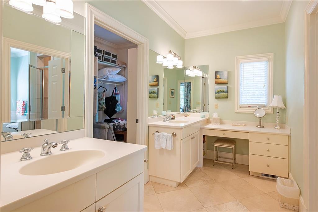 2785 Arden Road Northwest Atlanta, GA 30327 - Photo 18 of 34 a view of bathroom with a sink vanity and mirror