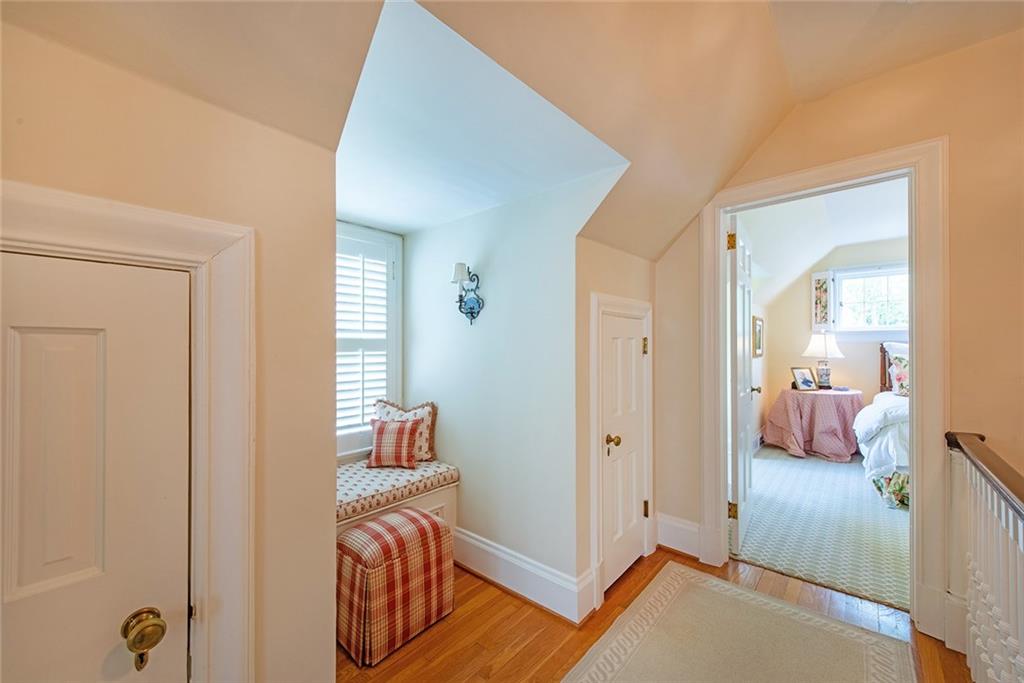 2785 Arden Road Northwest Atlanta, GA 30327 - Photo 21 of 34 a room that has a bed and a mirror