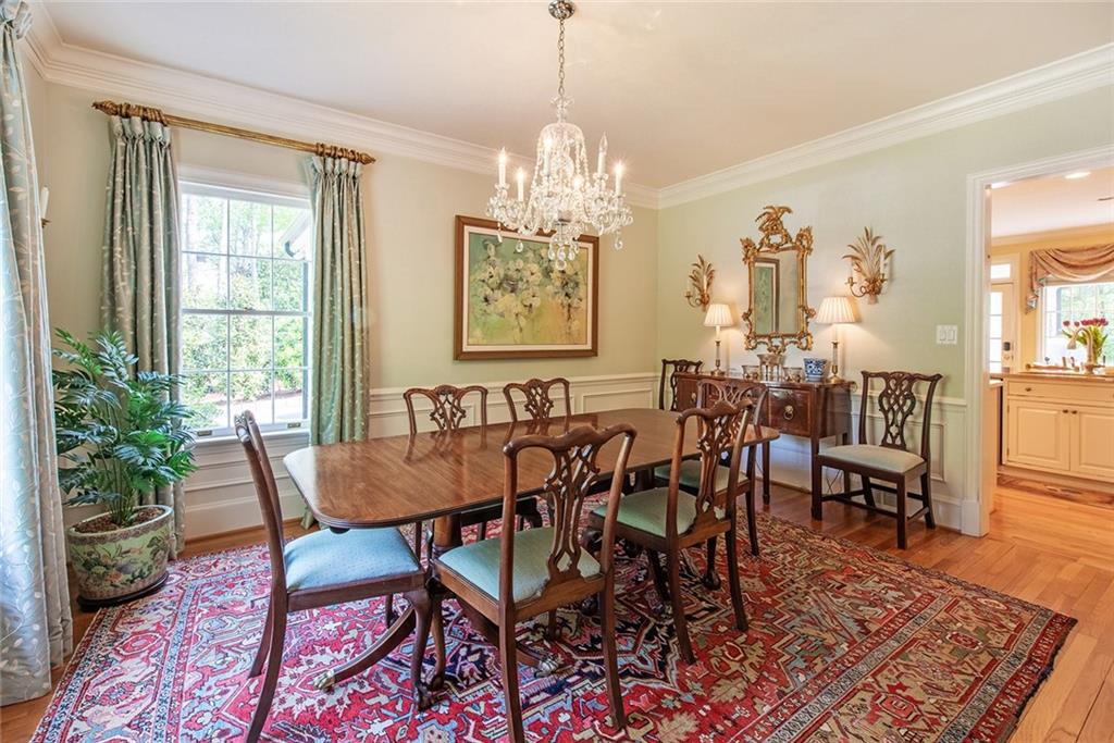 2785 Arden Road Northwest Atlanta, GA 30327 - Photo 6 of 34 a view of a dining room with furniture window and wooden floor