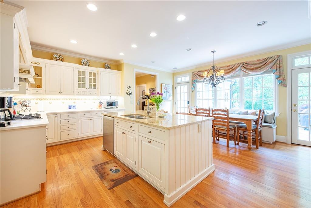 2785 Arden Road Northwest Atlanta, GA 30327 - Photo 8 of 34 a large kitchen with lots of counter space a sink and appliances