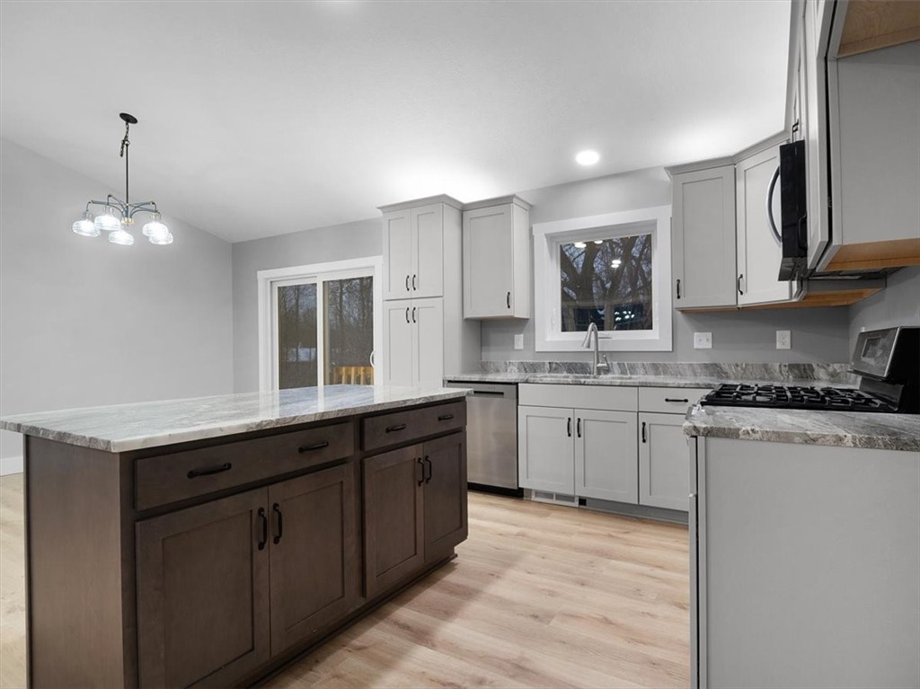 6648 Lakeside Road Ontario, NY 14519 - Photo 6 of 42 Kitchen Island with Storage and outlet on the side