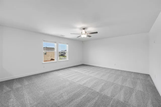 an aerial view of a house with outdoor space pool seating area and yard