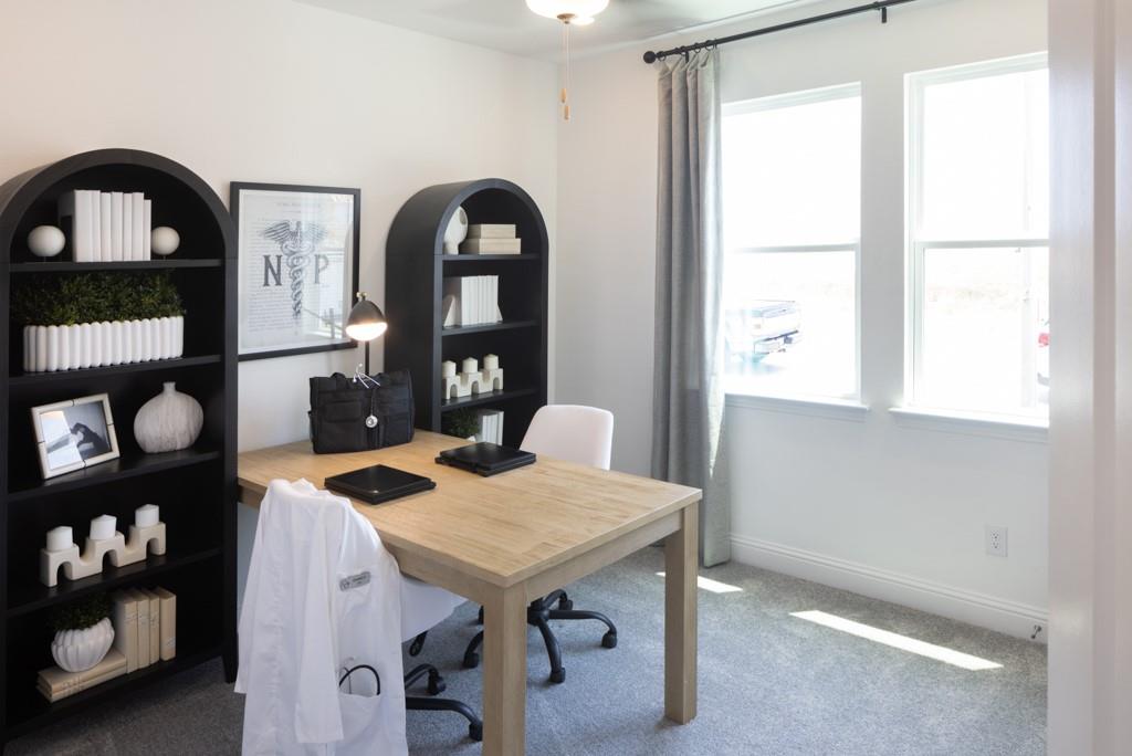 1451 Arciones Road Fort Worth, TX 76052 - Photo 10 of 30 a view of a dining room with furniture and window