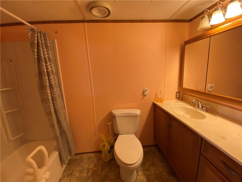225 Budapest Road Dilliner, PA 15327 - Photo 16 of 25 a bathroom with a sink and a mirror