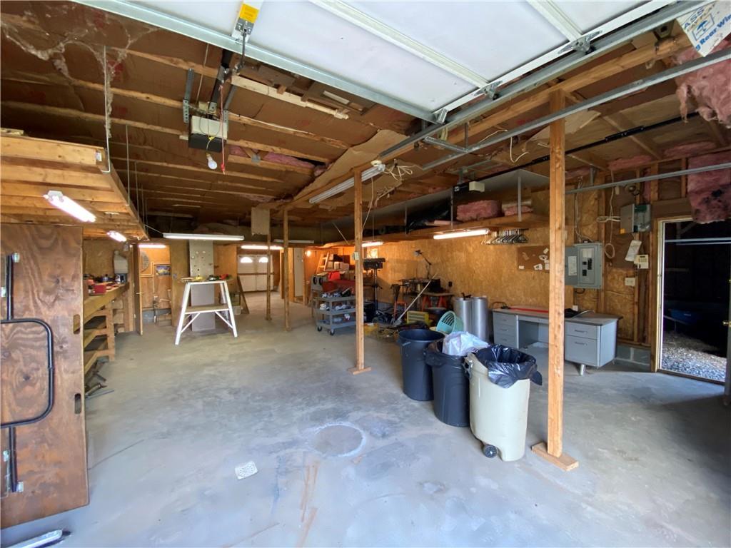 225 Budapest Road Dilliner, PA 15327 - Photo 22 of 25 a view of a storage room with racks