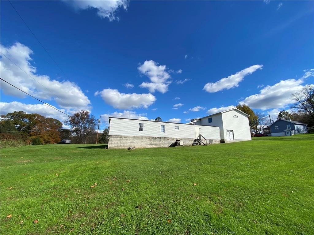 225 Budapest Road Dilliner, PA 15327 - Photo 4 of 25 a view of a house with a big yard