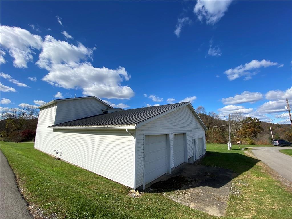 225 Budapest Road Dilliner, PA 15327 - Photo 8 of 25 a view of a house with a yard