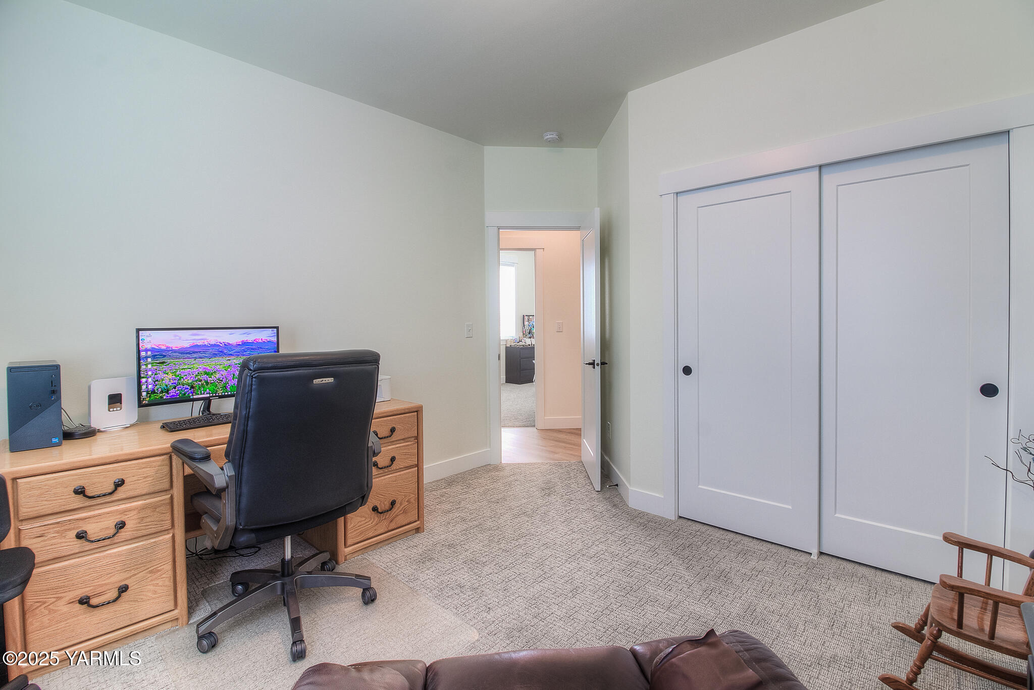 204 Rainier Street Yakima, WA 98908 - Photo 22 of 31 a view of a workspace with furniture and a window