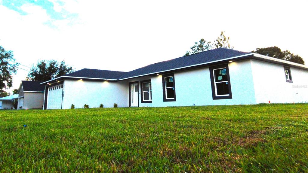 4115 El Rado Avenue Sebring, FL 33872 - Photo 20 of 31 a house view with a garden space