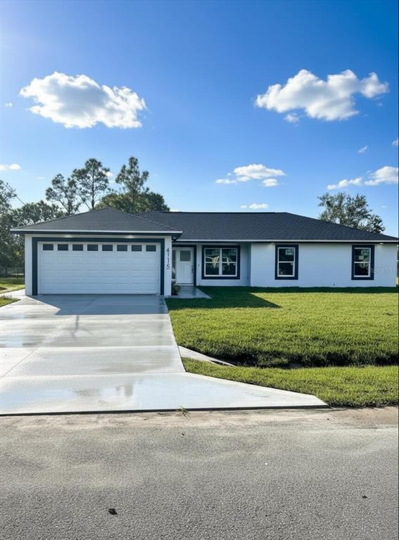 4115 El Rado Avenue Sebring, FL 33872 - Photo 2 of 31 a view of house with a big yard