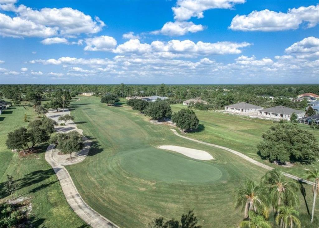 4115 El Rado Avenue Sebring, FL 33872 - Photo 26 of 31 a view of a lake in middle of the forest