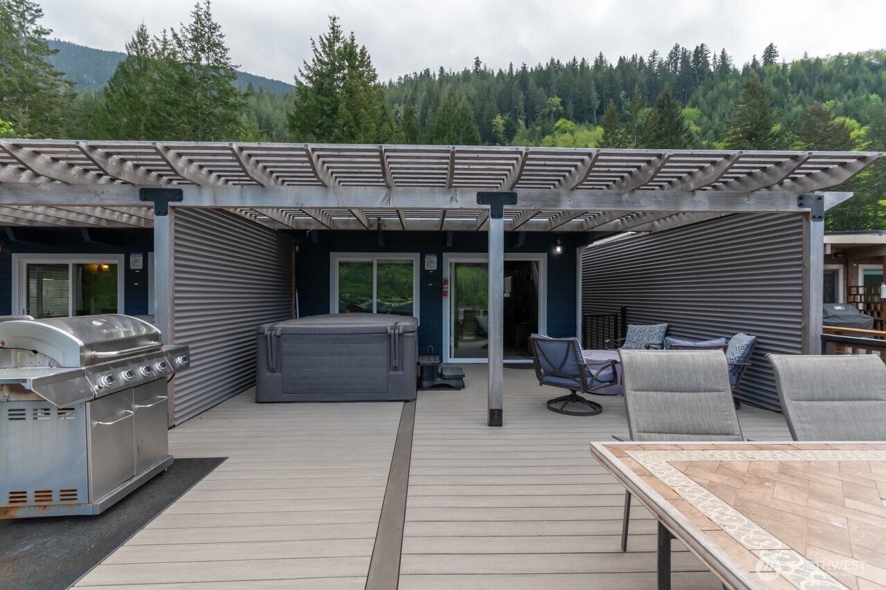 90-92 Mallard Cove Road Port Angeles, WA 98363 - Photo 12 of 40 a view of a patio on the roof deck