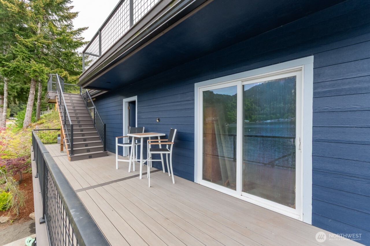 90-92 Mallard Cove Road Port Angeles, WA 98363 - Photo 16 of 40 a view of a balcony with chairs