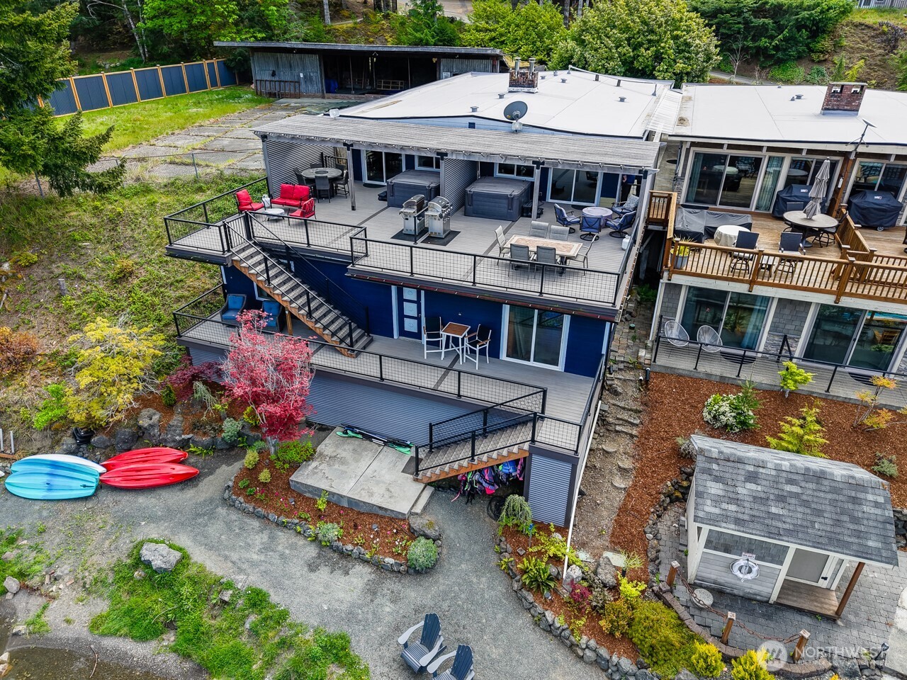 90-92 Mallard Cove Road Port Angeles, WA 98363 - Photo 3 of 40 an aerial view of a house with swimming pool garden and patio